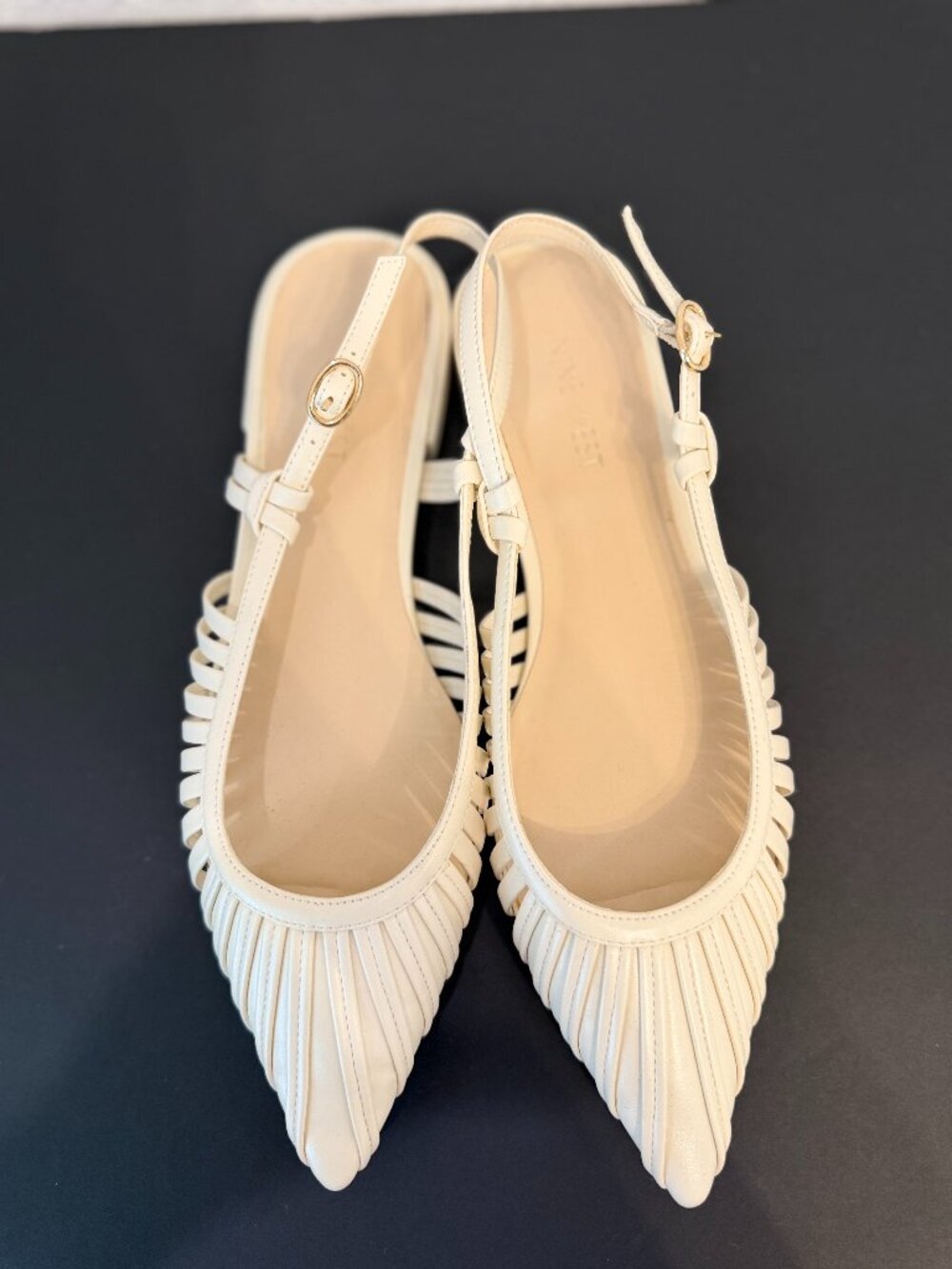 Beautiful Nine West pointed-toe flats in a classic ivory/cream color
